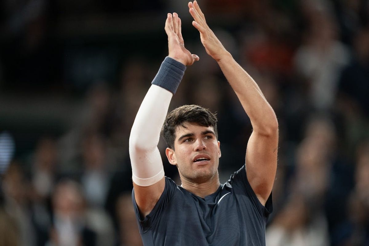 Jun 4, 2024; Paris, France; Carlos Alcaraz of Spain celebrates winning his match against Stefanos Tsitsipas of Greece on day 10 of Roland Garros at Stade Roland Garros. Mandatory Credit: Susan Mullane-USA TODAY Sports
