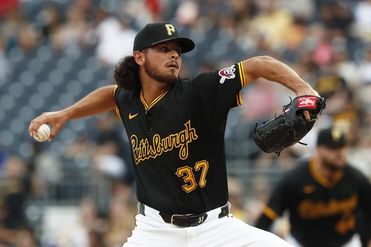 Jun 4, 2024; Pittsburgh, Pennsylvania, USA;  Pittsburgh Pirates starting pitcher Jared Jones (37) delivers a pitch against the Los Angeles Dodgers during the first inning at PNC Park. Mandatory Credit: Charles LeClaire-USA TODAY Sports