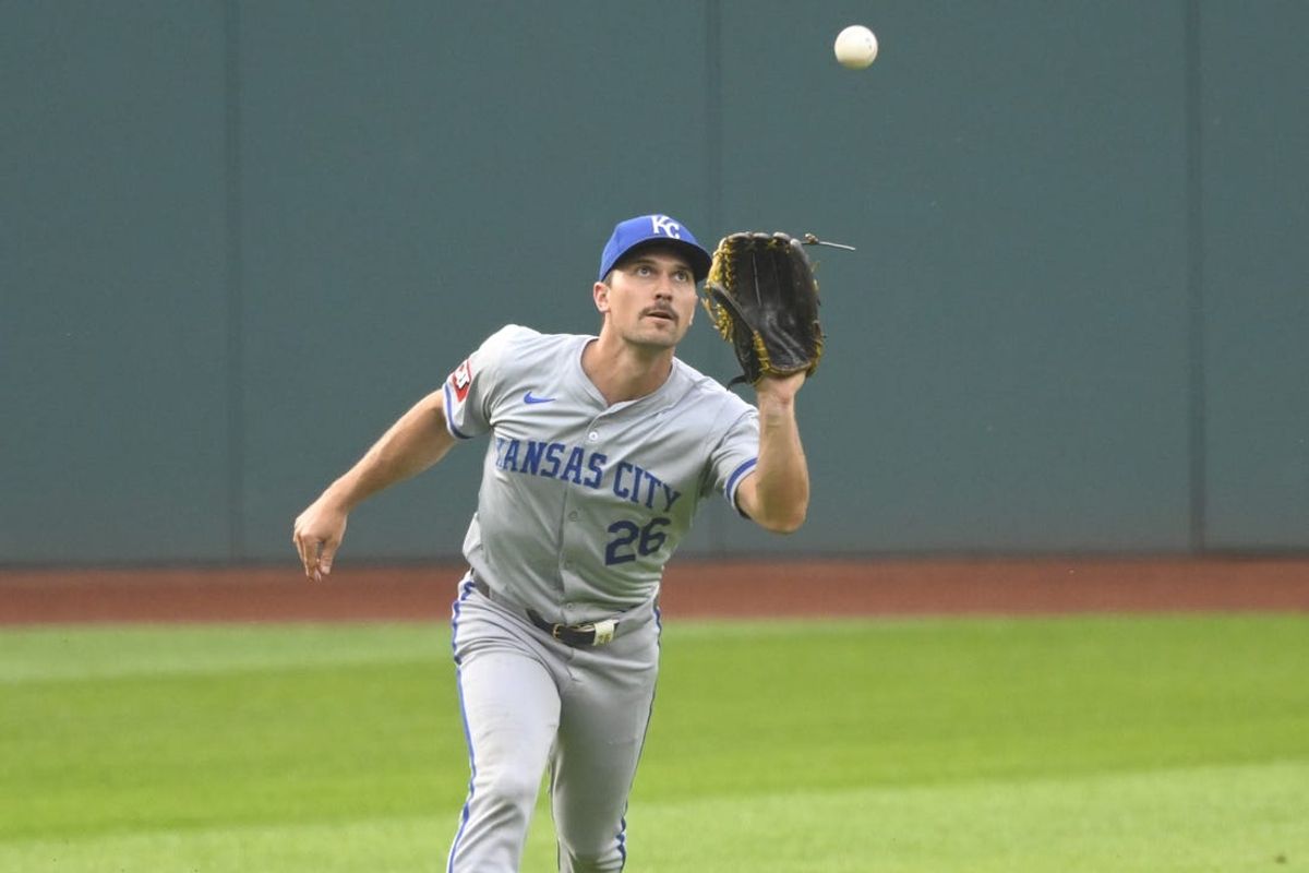 Jun 4, 2024; Cleveland, Ohio, USA; Kansas City Royals left fielder Adam Frazier (26) makes a catch in the first inning against the Cleveland Guardians at Progressive Field. Mandatory Credit: David Richard-USA TODAY Sports