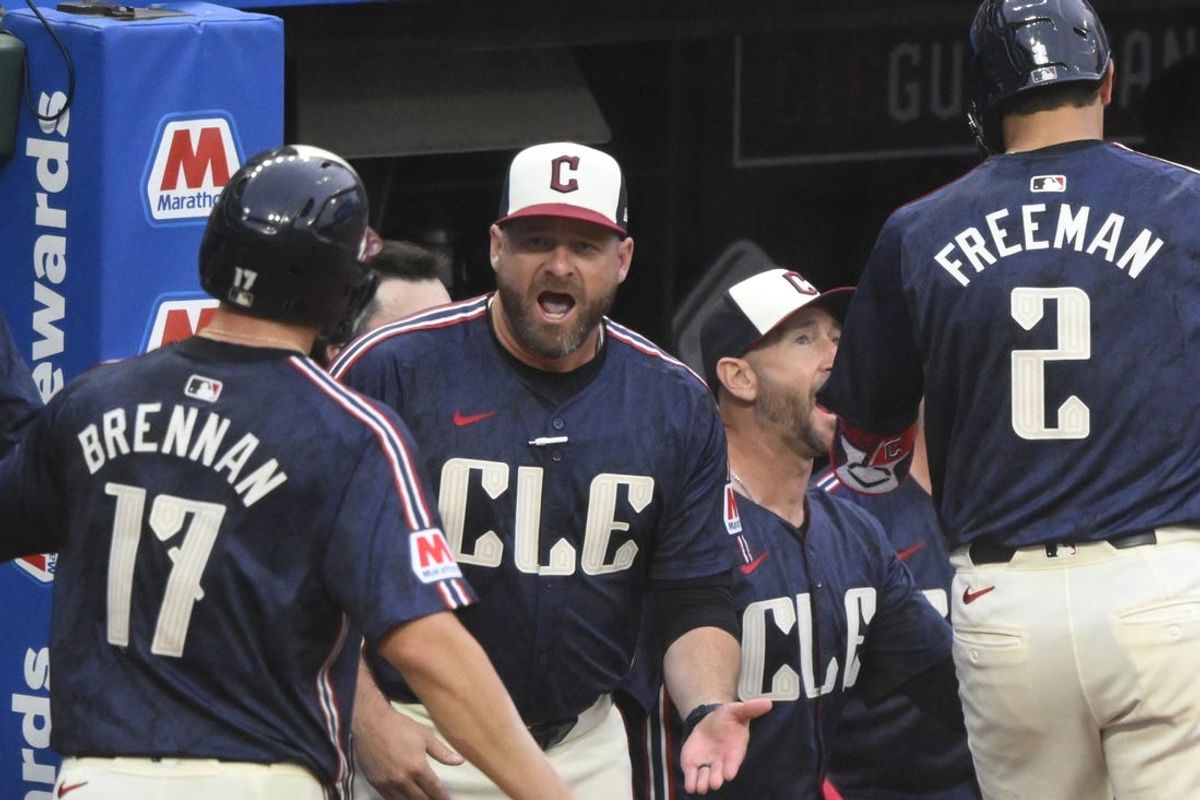 Jun 4, 2024; Cleveland, Ohio, USA; Cleveland Guardians manager Stephen Vogt (12) celebrates in the seventh inning against the Kansas City Royals at Progressive Field. Mandatory Credit: David Richard-USA TODAY Sports