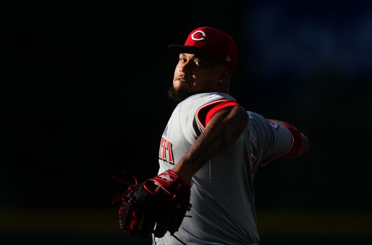 Jun 4, 2024; Denver, Colorado, USA; Cincinnati Reds starting pitcher Frankie Montas (47) delivers a pitch in the first inning against the Colorado Rockies at Coors Field. Mandatory Credit: Ron Chenoy-USA TODAY Sports