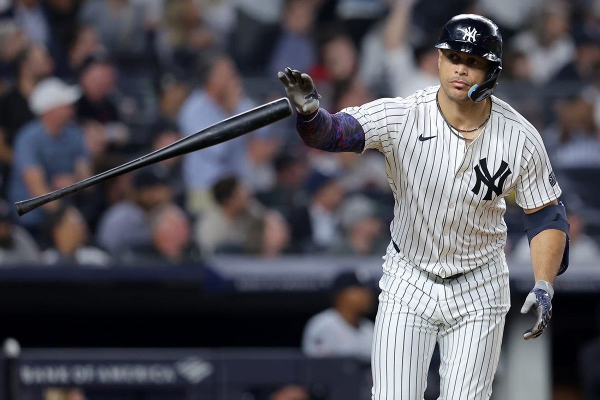 Jun 4, 2024; Bronx, New York, USA; New York Yankees designated hitter Giancarlo Stanton (27) tosses his bat after hitting a two run home run against the Minnesota Twins during the eighth inning at Yankee Stadium. Mandatory Credit: Brad Penner-USA TODAY Sports