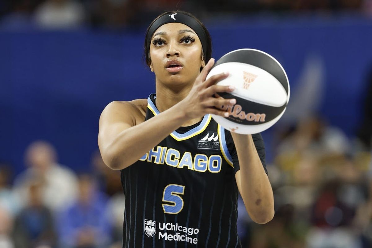 Jun 4, 2024; Chicago, Illinois, USA; Chicago Sky forward Angel Reese (5) shoots a free throw against the New York Liberty during the second half of a WNBA game at Wintrust Arena. Mandatory Credit: Kamil Krzaczynski-USA TODAY Sports