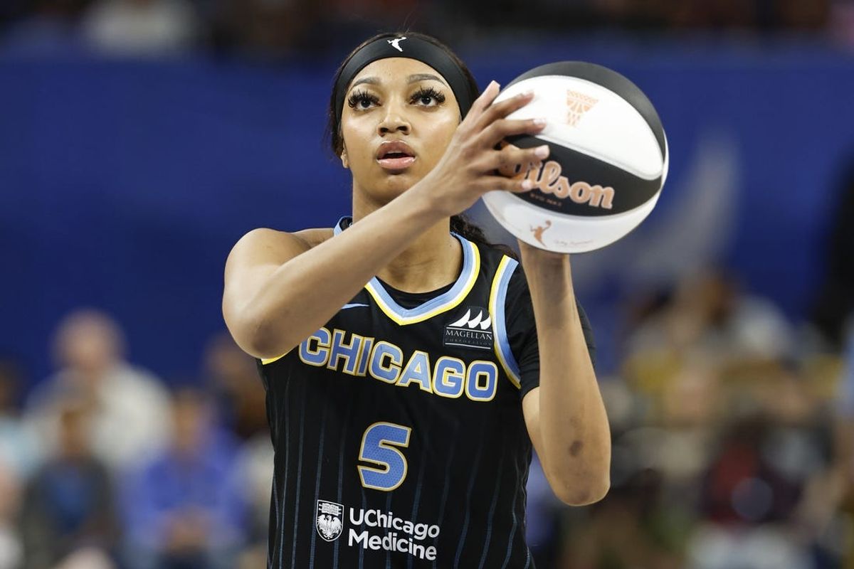 Jun 4, 2024; Chicago, Illinois, USA; Chicago Sky forward Angel Reese (5) shoots a free throw against the New York Liberty during the second half of a WNBA game at Wintrust Arena. Mandatory Credit: Kamil Krzaczynski-USA TODAY Sports