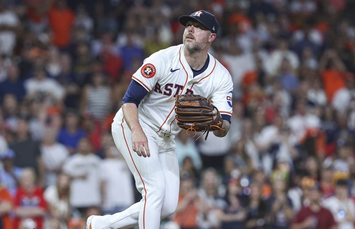 Jun 4, 2024; Houston, Texas, USA; Houston Astros relief pitcher Ryan Pressly (55) delivers a pitch during the ninth inning against the St. Louis Cardinals at Minute Maid Park. Mandatory Credit: Troy Taormina-USA TODAY Sports