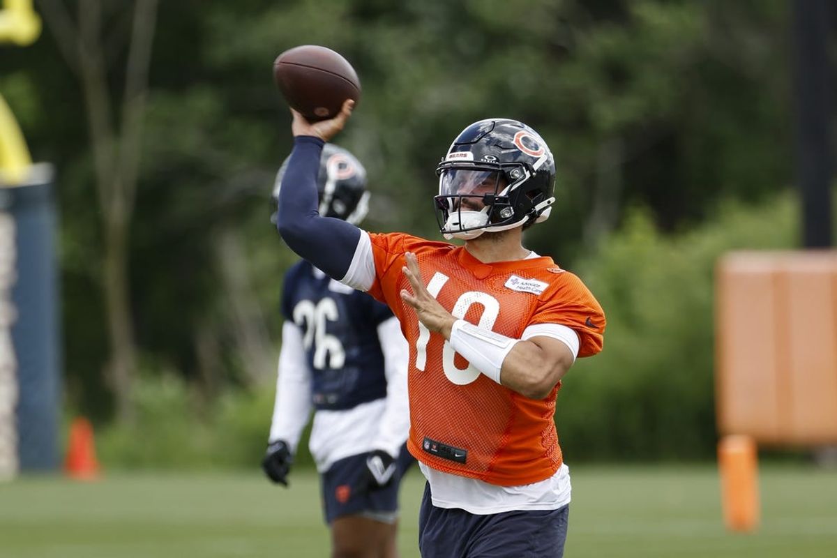 Jun 5, 2024; Lake Forest, IL, USA; Chicago Bears quarterback Caleb Williams (18) passes the ball during the team's minicamp at Halas Hall. Mandatory Credit: Kamil Krzaczynski-USA TODAY Sports