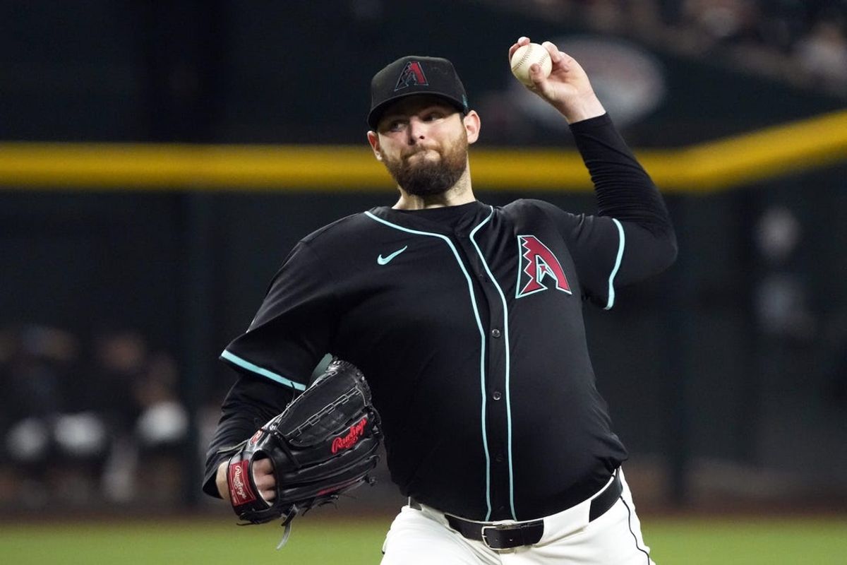 Jun 5, 2024; Phoenix, Arizona, USA; Arizona Diamondbacks pitcher Jordan Montgomery (52) throws against the San Francisco Giants in the first inning at Chase Field. Mandatory Credit: Rick Scuteri-USA TODAY Sports