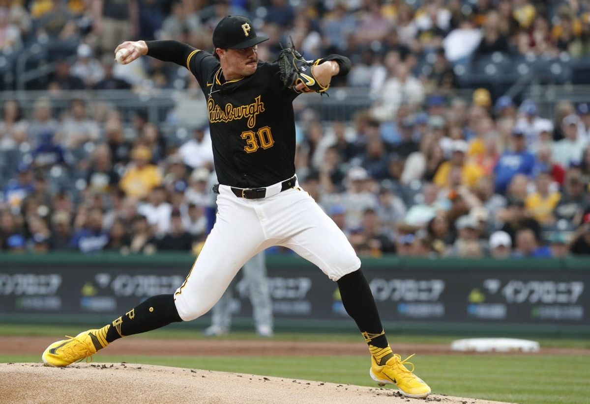 Jun 5, 2024; Pittsburgh, Pennsylvania, USA;  Pittsburgh Pirates starting pitcher Paul Skenes (30) delivers a pitch against the Los Angeles Dodgers during the first inning at PNC Park. Mandatory Credit: Charles LeClaire-USA TODAY Sports