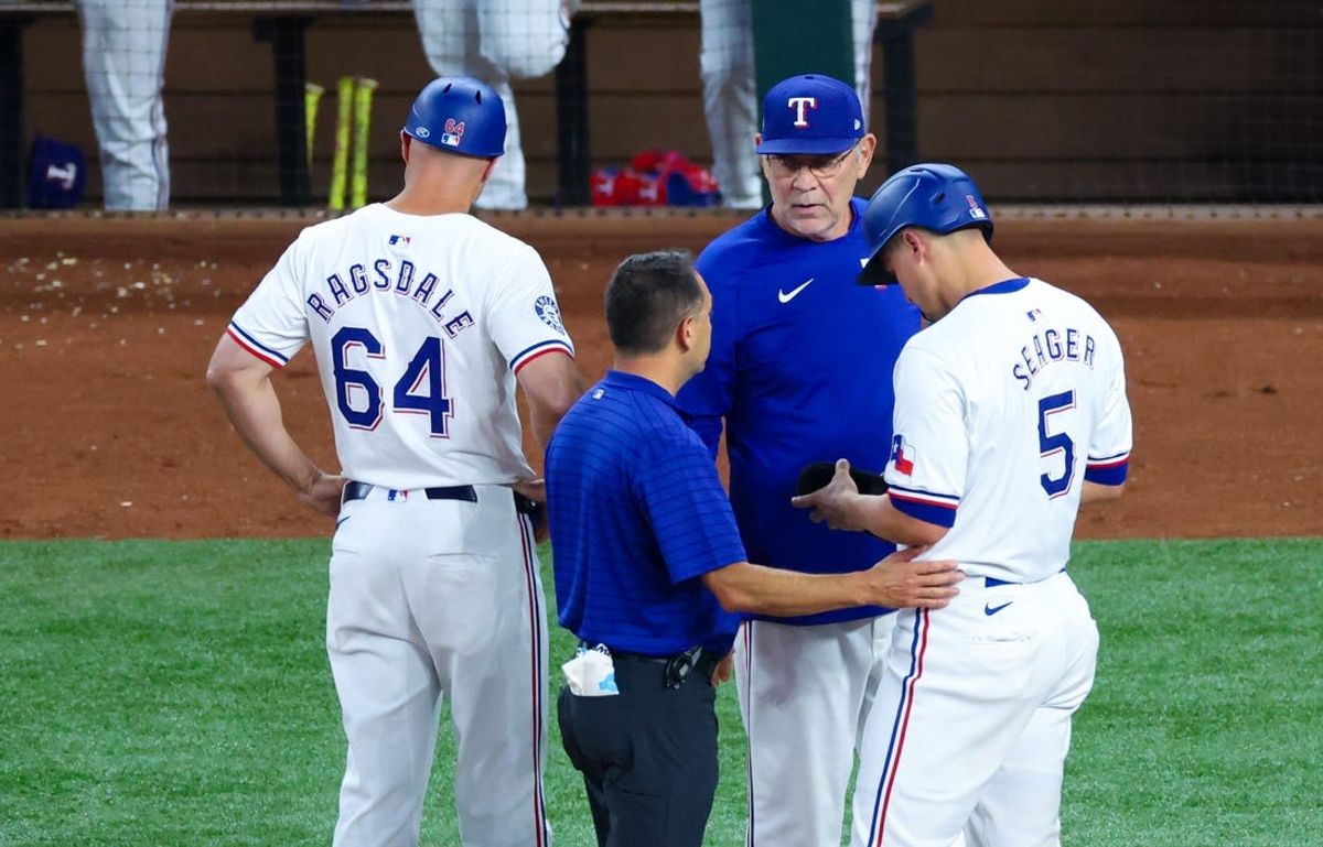 Jun 5, 2024; Arlington, Texas, USA;  Texas Rangers shortstop Corey Seager (5) leaves the game during the third inning against the Detroit Tigers at Globe Life Field. Mandatory Credit: Kevin Jairaj-USA TODAY Sports