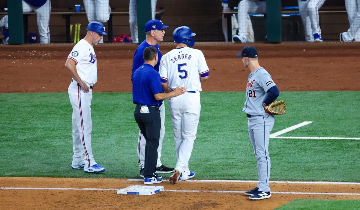 Jun 5, 2024; Arlington, Texas, USA;  Texas Rangers shortstop Corey Seager (5) leaves the game during the third inning against the Detroit Tigers at Globe Life Field. Mandatory Credit: Kevin Jairaj-USA TODAY Sports