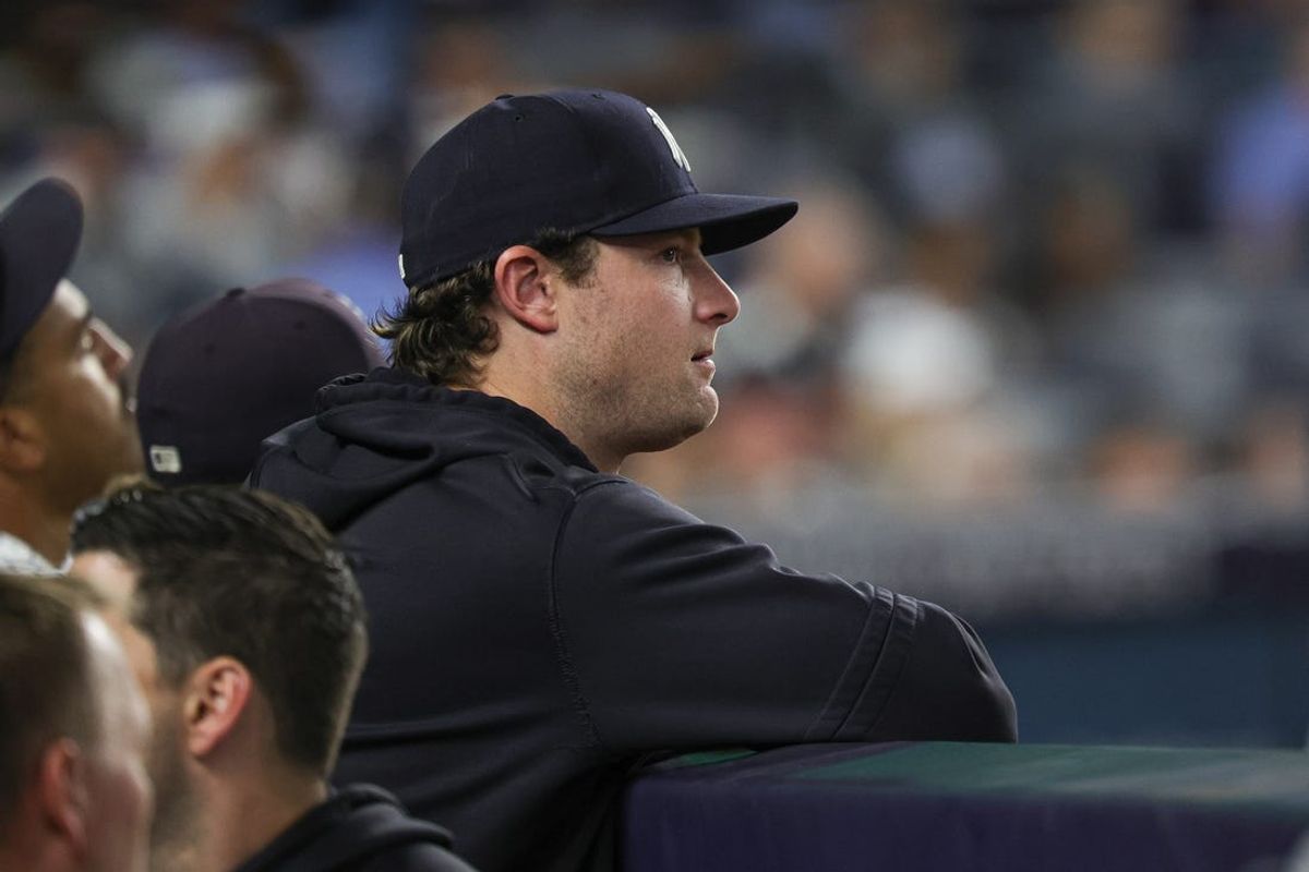 Jun 5, 2024; Bronx, New York, USA; New York Yankees pitcher Gerrit Cole (45) looks on from the dug out during the eighth inning against the Minnesota Twins at Yankee Stadium. Mandatory Credit: Vincent Carchietta-USA TODAY Sports