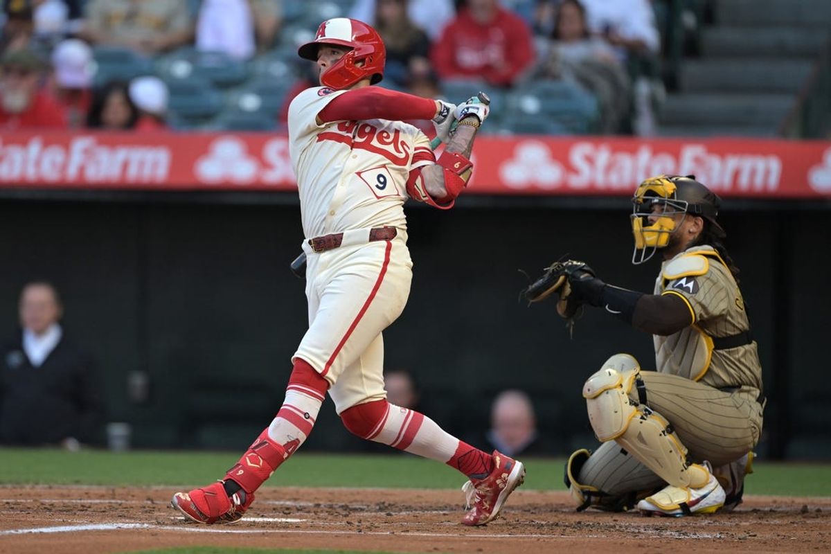 Jun 5, 2024; Anaheim, California, USA;  Los Angeles Angels shortstop Zach Neto (9) follows through on a  two-run home run in the second inning against the San Diego Padres at Angel Stadium. Mandatory Credit: Jayne Kamin-Oncea-USA TODAY Sports