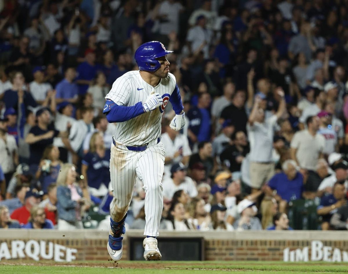 Jun 5, 2024; Chicago, Illinois, USA; Chicago Cubs outfielder Mike Tauchman (40) rounds the bases after hitting a walk-off home run against the Chicago White Sox during the ninth inning at Wrigley Field. Mandatory Credit: Kamil Krzaczynski-USA TODAY Sports