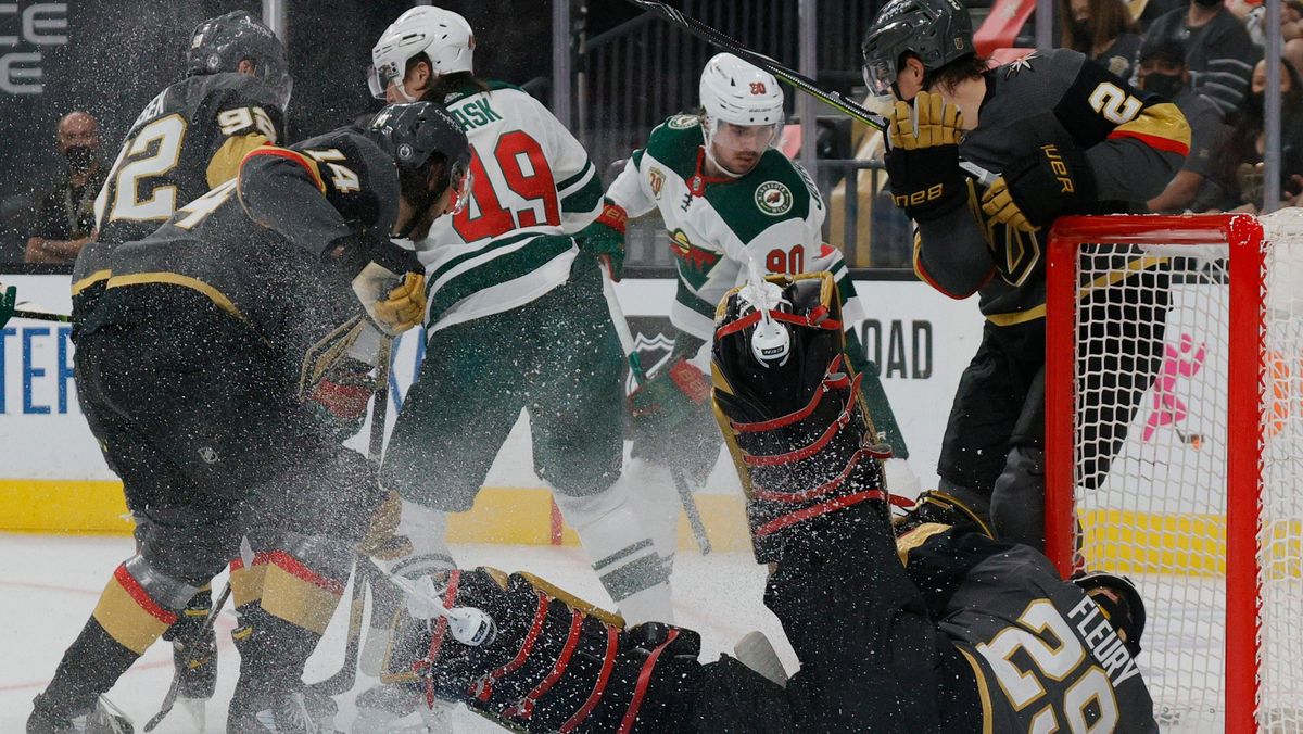 Marc-Andre Fleury of the Vegas Golden Knights makes a save against Victor Rask of the Minnesota Wild in the first period of Game One of the First Round of the 2021 Stanley Cup Playoffs.