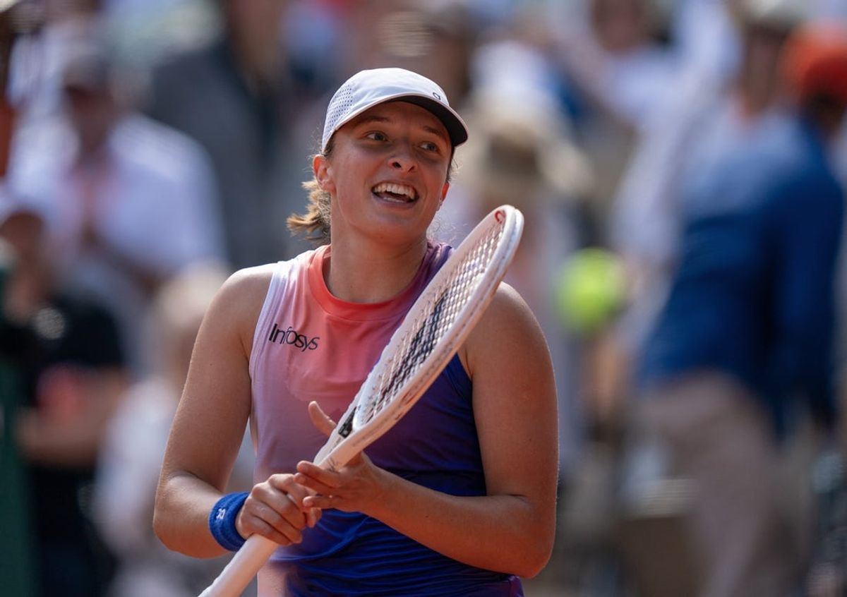 Jun 6, 2024; Paris, France; Iga Swiatek of Poland celebrates winning her match against Coco Gauff of the United States on day 12 of Roland Garros at Stade Roland Garros. Mandatory Credit: Susan Mullane-USA TODAY Sports