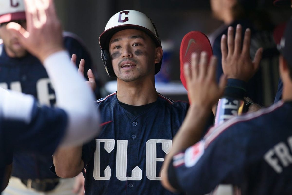 Jun 6, 2024; Cleveland, Ohio, USA; Cleveland Guardians left fielder Steven Kwan (38) celebrates after scoring during the first inning against the Kansas City Royals at Progressive Field. Mandatory Credit: Ken Blaze-USA TODAY Sports