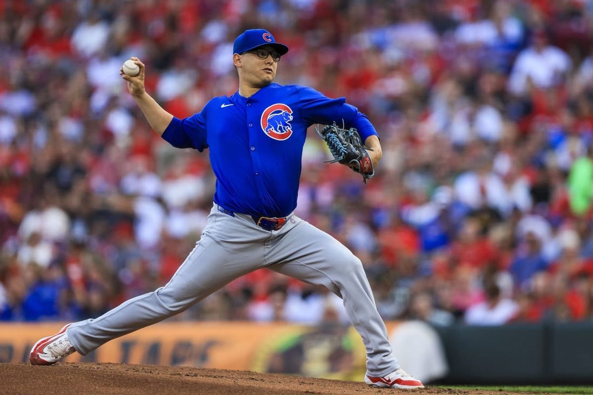Jun 6, 2024; Cincinnati, Ohio, USA; Chicago Cubs starting pitcher Javier Assad (72) pitches against the Cincinnati Reds in the first inning at Great American Ball Park. Mandatory Credit: Katie Stratman-USA TODAY Sports