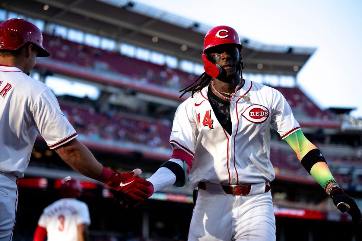 Cincinnati Reds shortstop Elly De La Cruz (44) celebrates with Cincinnati Reds first baseman Spencer Steer (7) after hitting a 3-run home run to take a one run lead in the third inning of the MLB game between the Cincinnati Reds and the Chicago Cubs at Great American Ball Park in Cincinnati on Thursday, June 6, 2024.
