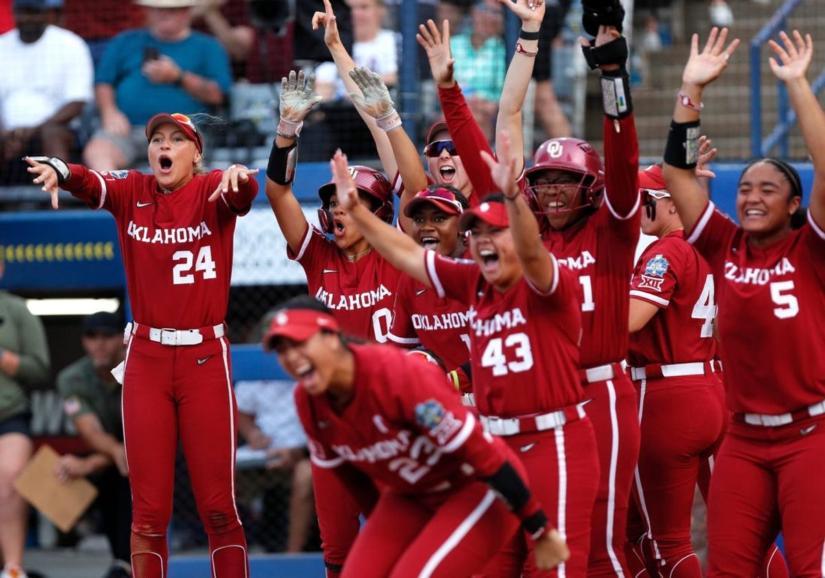 Oklahoma celebrates a 2-run home run by Oklahoma outfielder Kasidi Pickering (7) in the second inning during Game 2 of the NCAA softball Women's College World Series Championship Series game between the Oklahoma Sooners (OU) and Texas Longhorns at Devon Park in Oklahoma City, Thursday, June, 6, 2024.