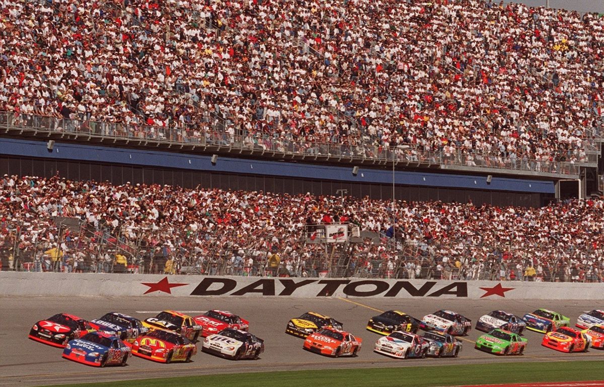 A huge crowd watches the opening lap of the Daytona 500 on Sunday, Feb.20, 2000.