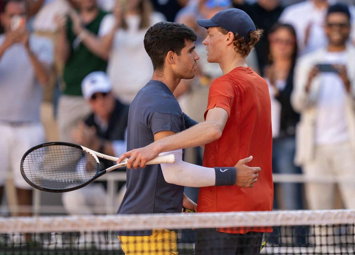 Jun 7, 2024; Paris, France; Carlos Alcaraz of Spain and Jannik Sinner of Italy of Italy after their match on day 13 of Roland Garros at Stade Roland Garros. Mandatory Credit: Susan Mullane-Imagn Images