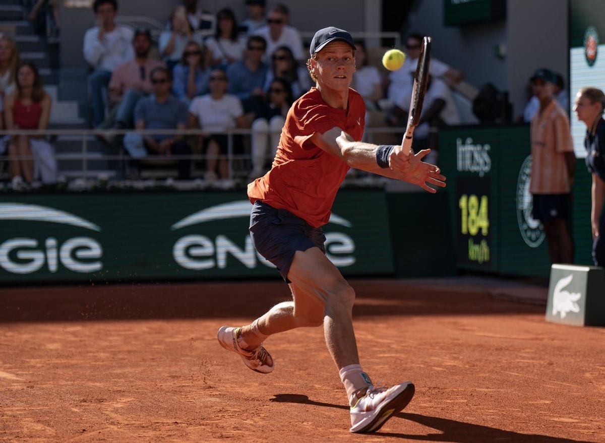 Jun 7, 2024; Paris, France; Jannik Sinner of Italy returns a shot during his match against Carlos Alcaraz of Spain on day 13 of Roland Garros at Stade Roland Garros. Mandatory Credit: Susan Mullane-USA TODAY Sports