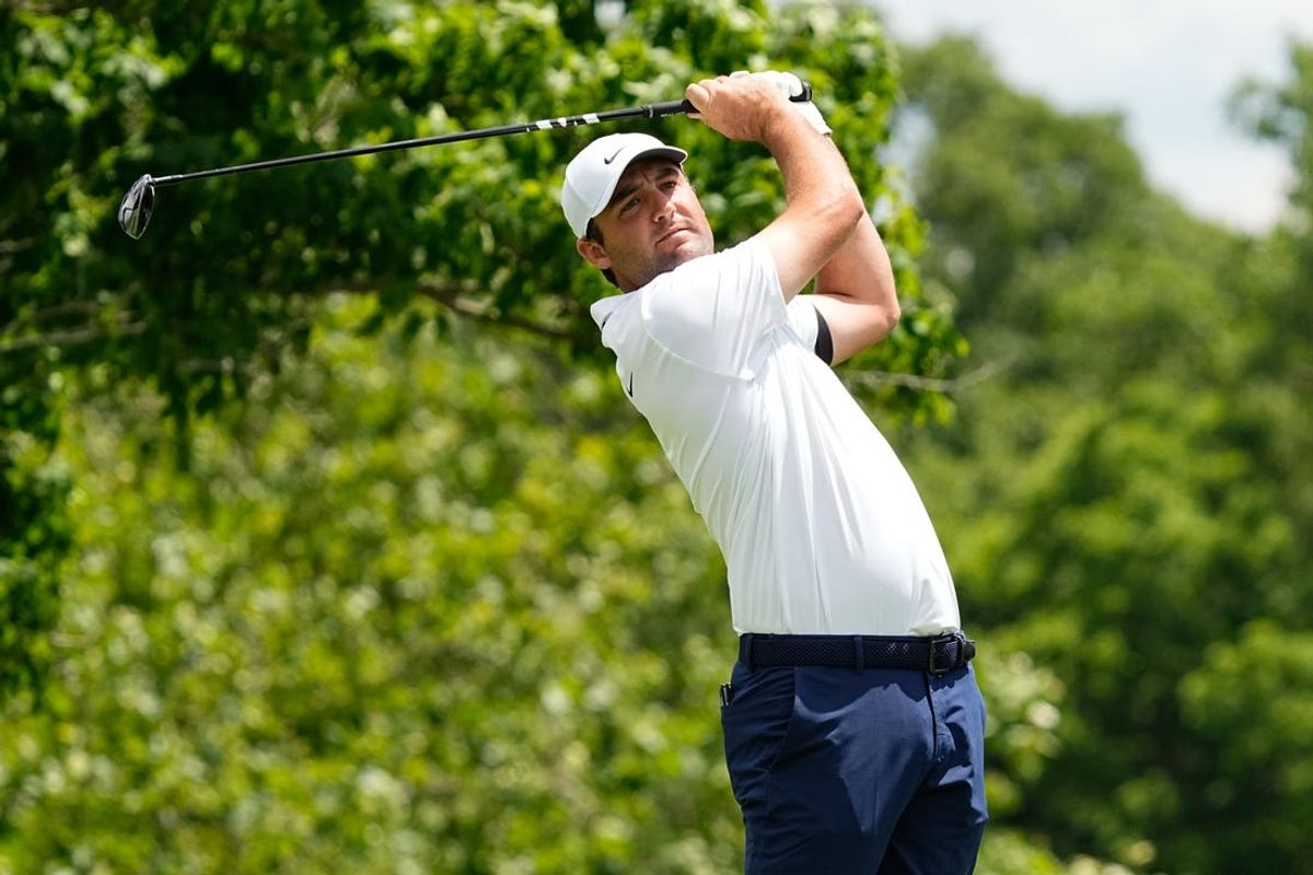 Jun 7, 2024; Dublin, Ohio, USA; Scottie Scheffler tees off on the fifth hole during the second round of the Memorial Tournament at Muirfield Village Golf Club. Mandatory Credit: Adam Cairns-USA TODAY Sports