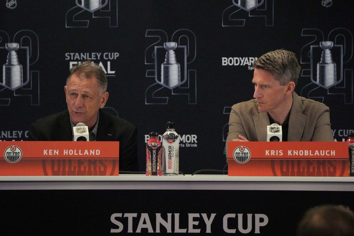 Jun 7, 2024; Sunrise, Florida, USA; Edmonton Oilers general manager Ken Holland, left, and head coach Kris Knoblauch take questions during media day in advance of the 2024 Stanley Cup Final at Amerant Bank Arena. Mandatory Credit: Jim Rassol-Imagn Images