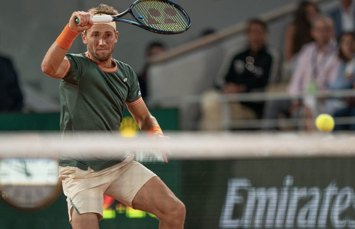 Jun 7, 2024; Paris, France; Casper Ruud of Norway returns a shot during his match against Alexander Zverev of Germany on day 13 of Roland Garros at Stade Roland Garros. Mandatory Credit: Susan Mullane-Imagn Images