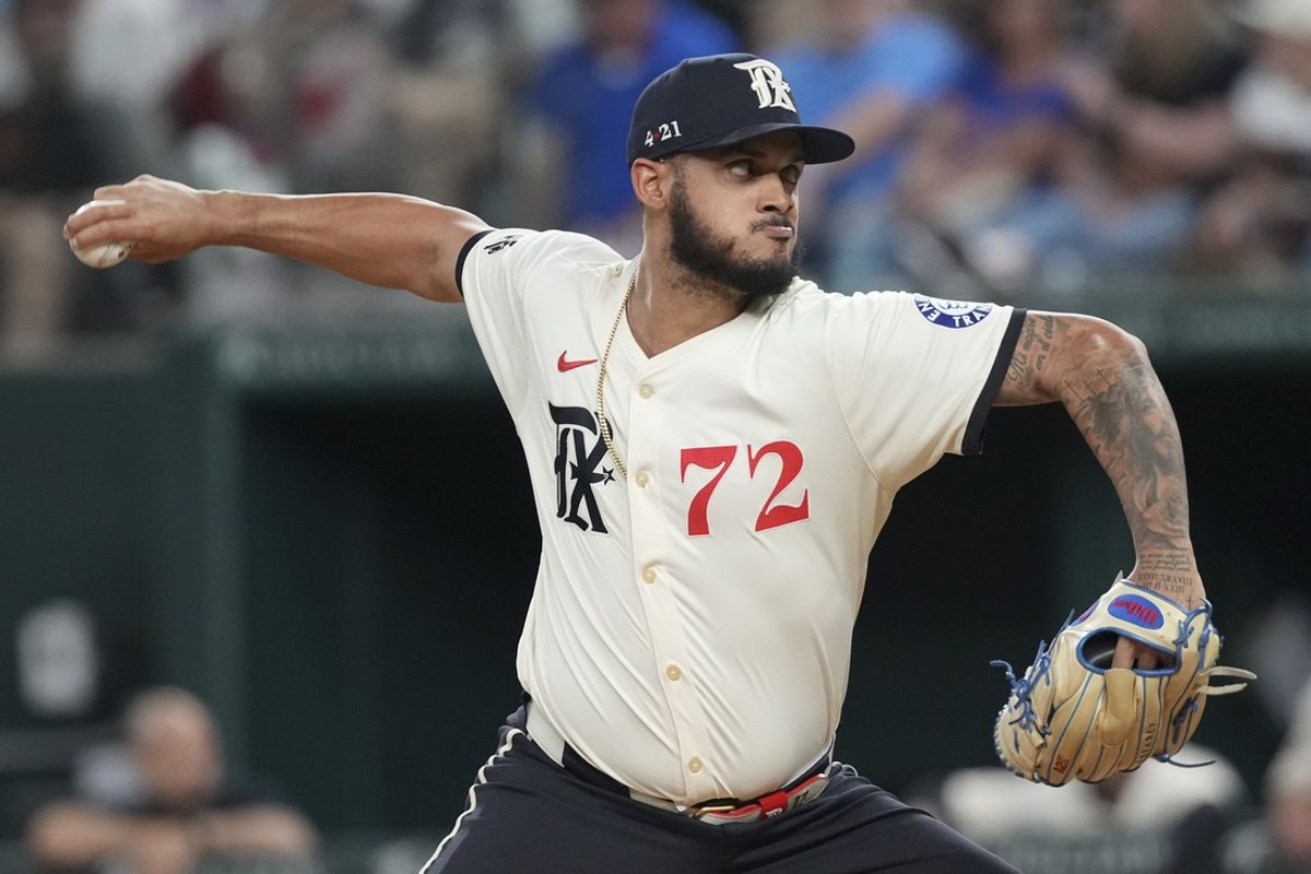 Jun 7, 2024; Arlington, Texas, USA; Texas Rangers relief pitcher Jonathan Hernandez (72) delivers a pitch to the San Francisco Giants during the sixth inning at Globe Life Field. Mandatory Credit: Jim Cowsert-USA TODAY Sports