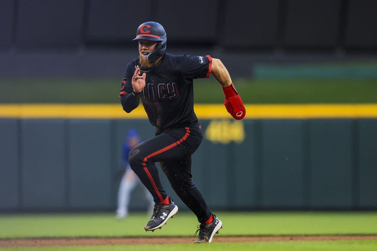 Jun 7, 2024; Cincinnati, Ohio, USA; Cincinnati Reds outfielder Blake Dunn (76) scores on a RBI single hit by outfielder Stuart Fairchild (not pictured) in the fifth inning against the Chicago Cubs at Great American Ball Park. Mandatory Credit: Katie Stratman-USA TODAY Sports