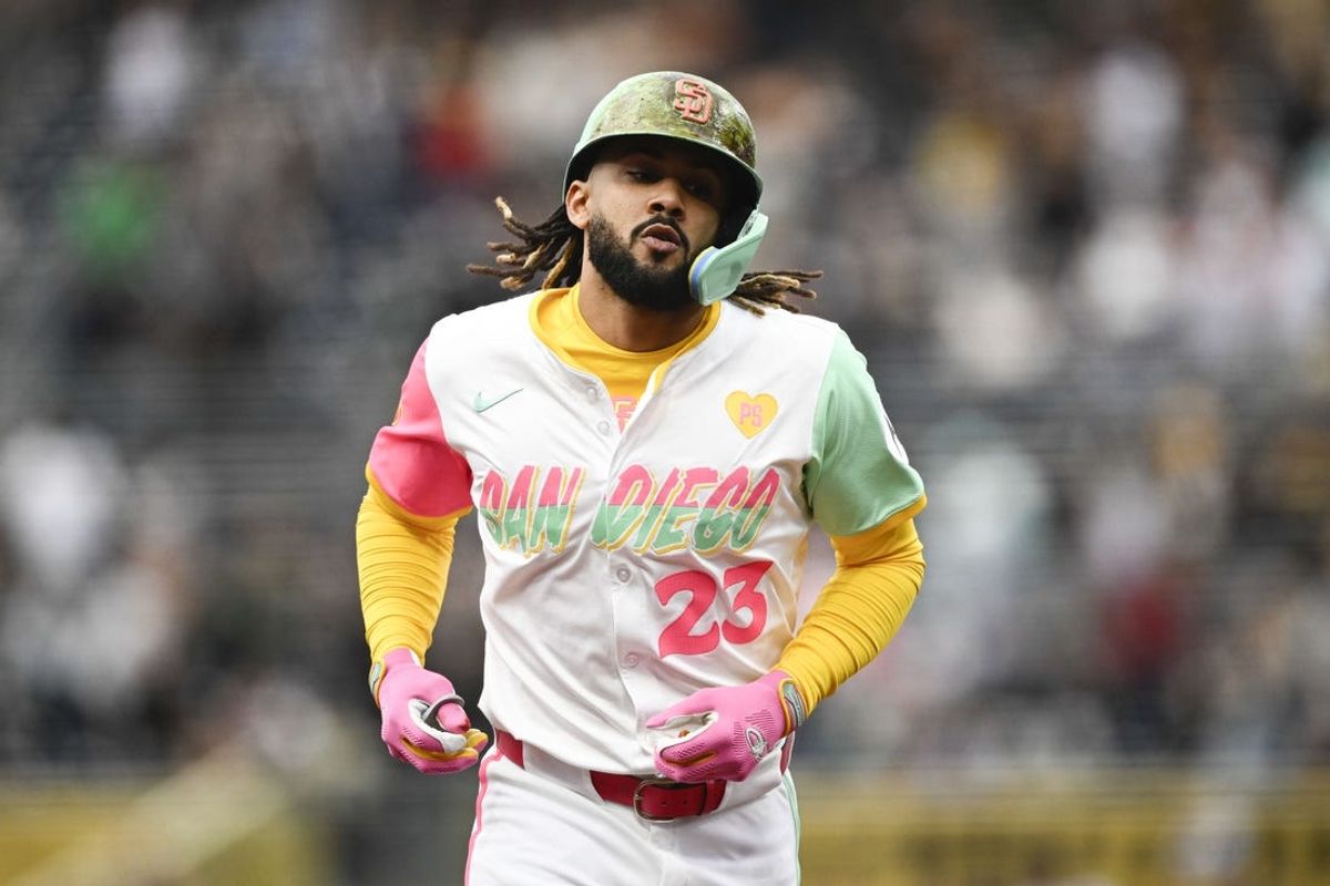 Jun 7, 2024; San Diego, California, USA; San Diego Padres right fielder Fernando Tatis Jr. (23) rounds the bases after hitting a solo home run during the first inning against the Arizona Diamondbacks at Petco Park. Mandatory Credit: Denis Poroy-USA TODAY Sports at Petco Park.
