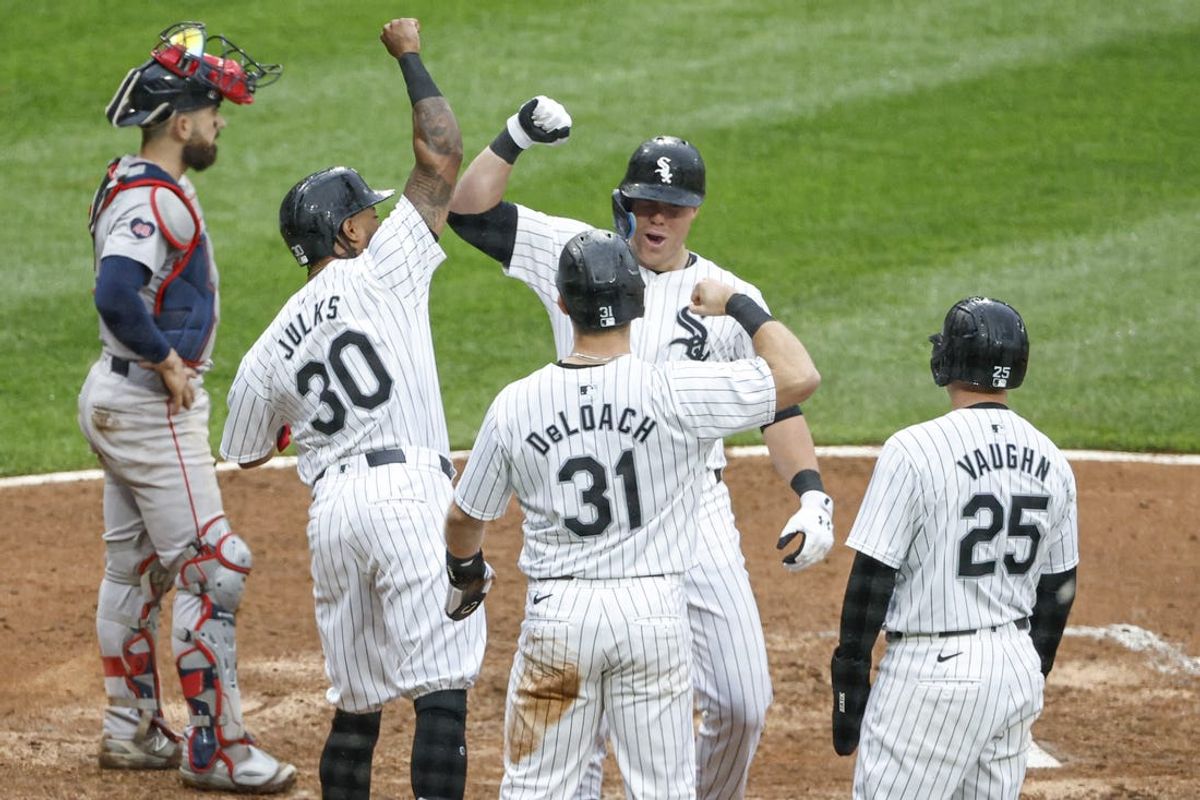 Jun 8, 2024; Chicago, Illinois, USA; Chicago White Sox outfielder Gavin Sheets (32) celebrates with teammates after hitting a grand slam against the Boston Red Sox during the fifth inning at Guaranteed Rate Field. Mandatory Credit: Kamil Krzaczynski-USA TODAY Sports