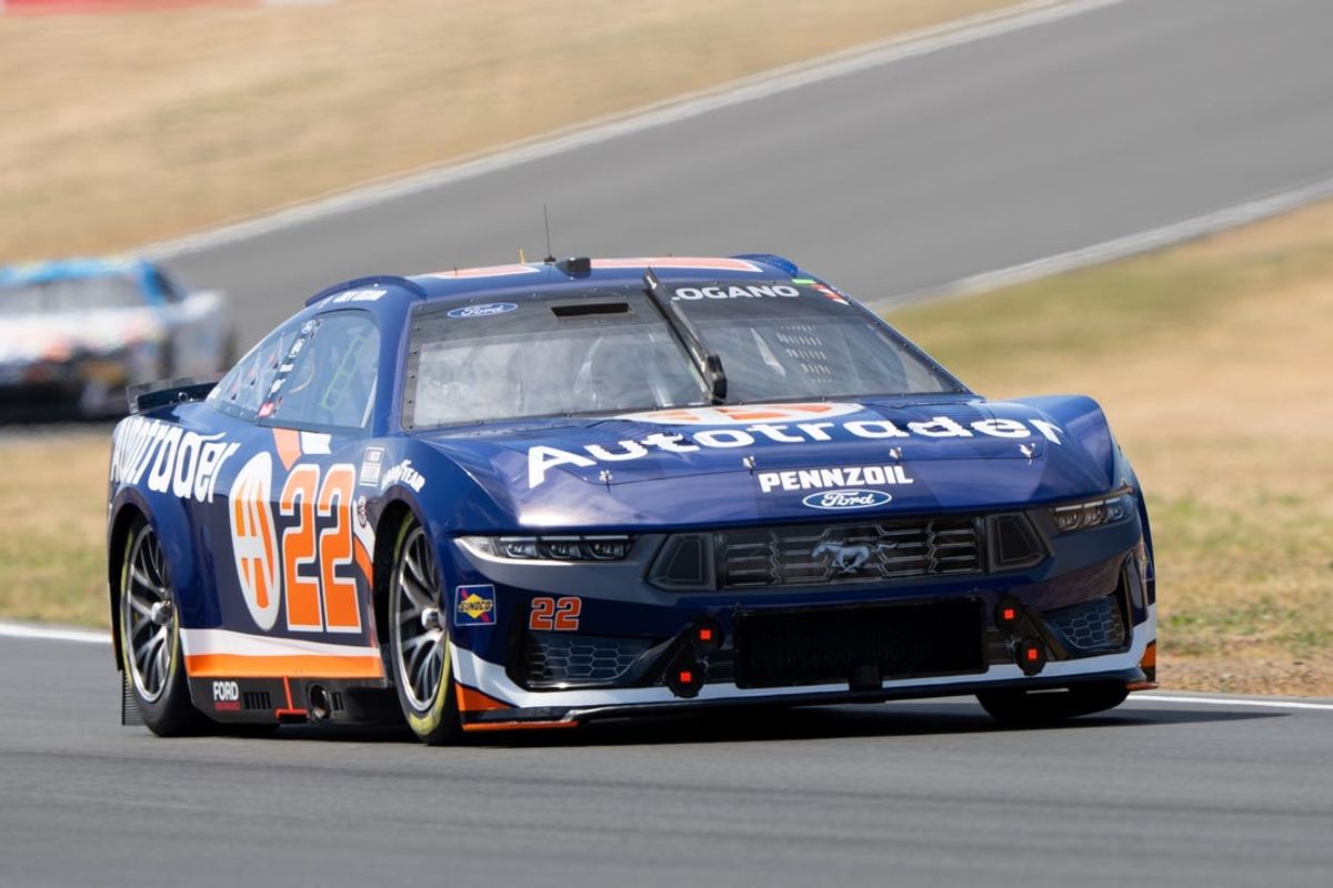 Jun 8, 2024; Sonoma, California, USA;  NASCAR Cup Series driver Joey Logano (22) races for cup qualifications at Sonoma Raceway. Mandatory Credit: Stan Szeto-USA TODAY Sports