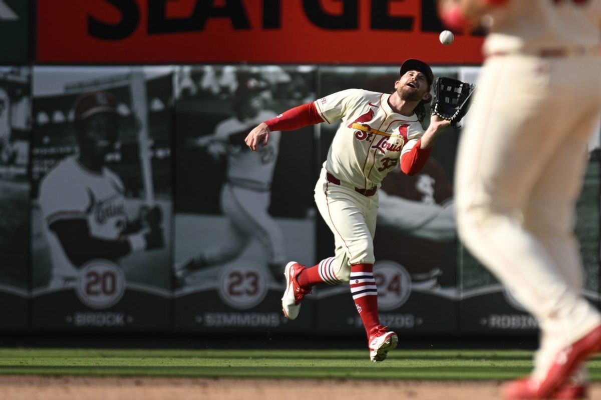Jun 8, 2024; St. Louis, Missouri, USA; St. Louis Cardinals outfielder Brendan Donovan (33) makes the catch against  the Colorado Rockies’ Michael Toglia (not pictured) during the eighth inning at Busch Stadium. Mandatory Credit: Jeff Le-USA TODAY Sports