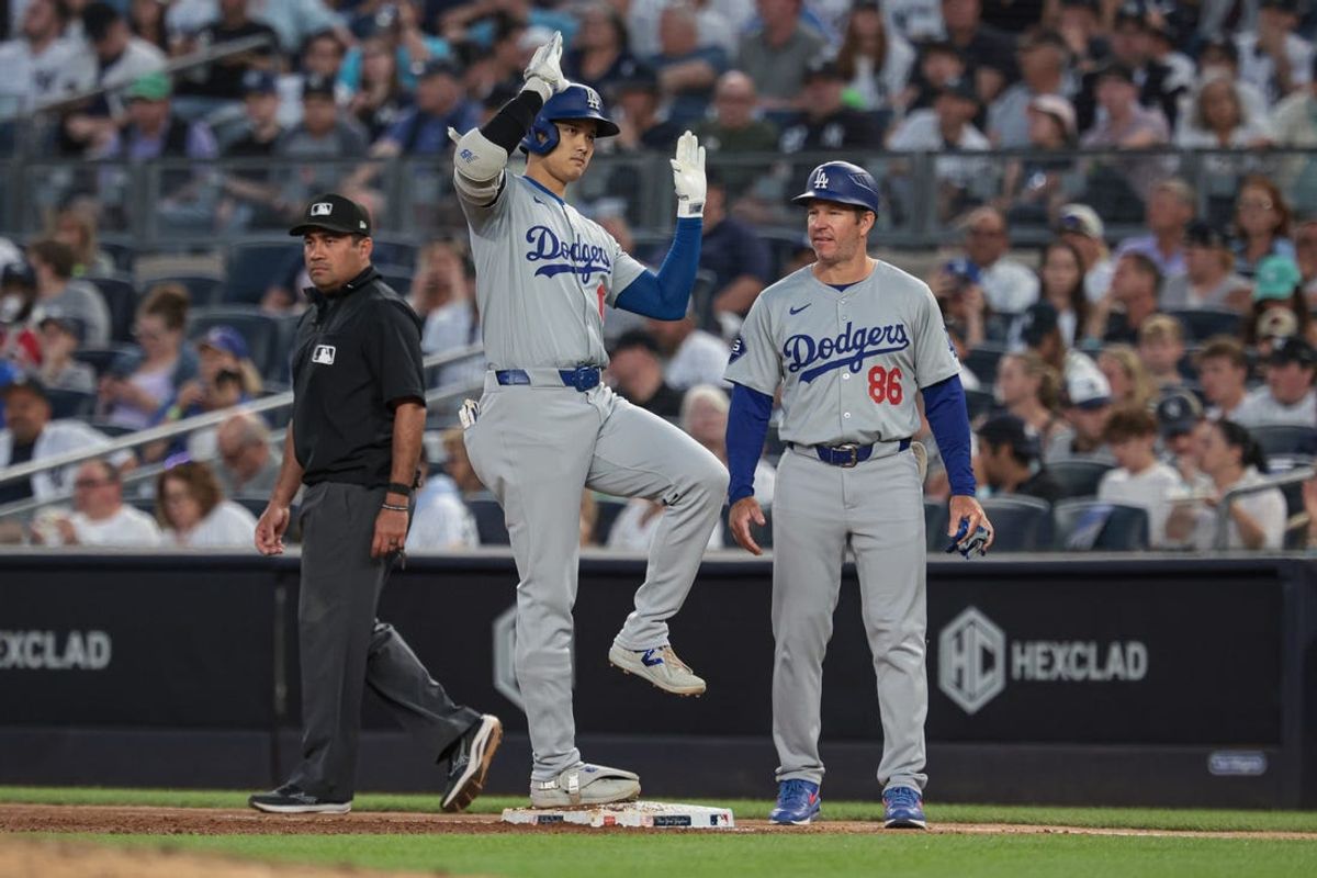 Jun 8, 2024; Bronx, New York, USA; Los Angeles Dodgers designated hitter Shohei Ohtani (17) reacts after hitting a RBI single during the third inning against the New York Yankees at Yankee Stadium. Mandatory Credit: Vincent Carchietta-USA TODAY Sports