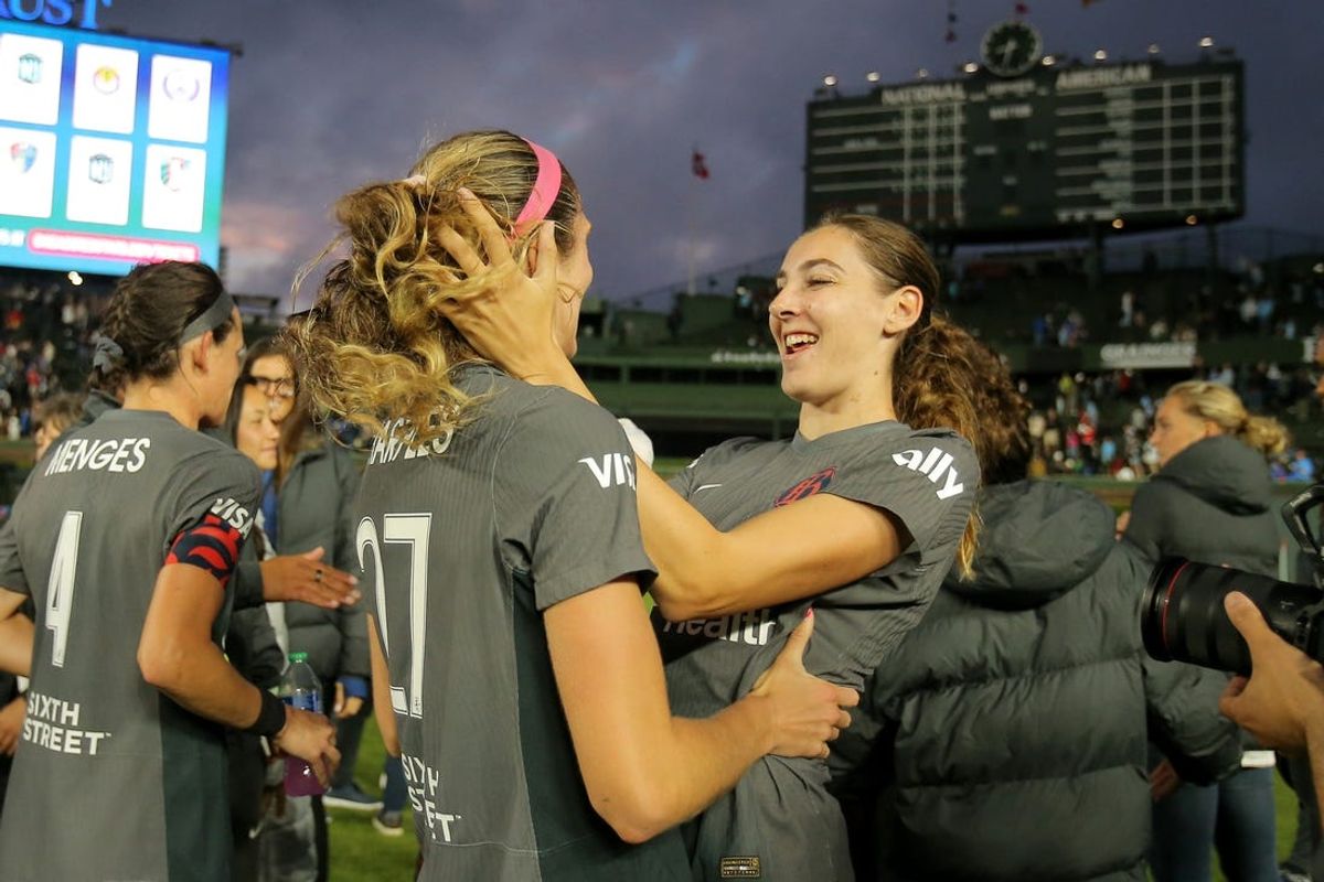 Jun 8, 2024; Chicago, Illinois, USA; Bay FC midfielder Joelle Anderson (18) and defender Kayla Sharples (27) celebrate after the match against the Chicago Red Stars at Wrigley Field. Mandatory Credit: Melissa Tamez-USA TODAY Sports