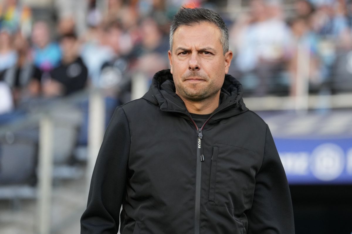 Jun 8, 2024; Saint Paul, Minnesota, USA; FC Dallas head coach Nico Estevez enters the pitch before the match against the Minnesota United at Allianz Field. Mandatory Credit: Brace Hemmelgarn-Imagn Images