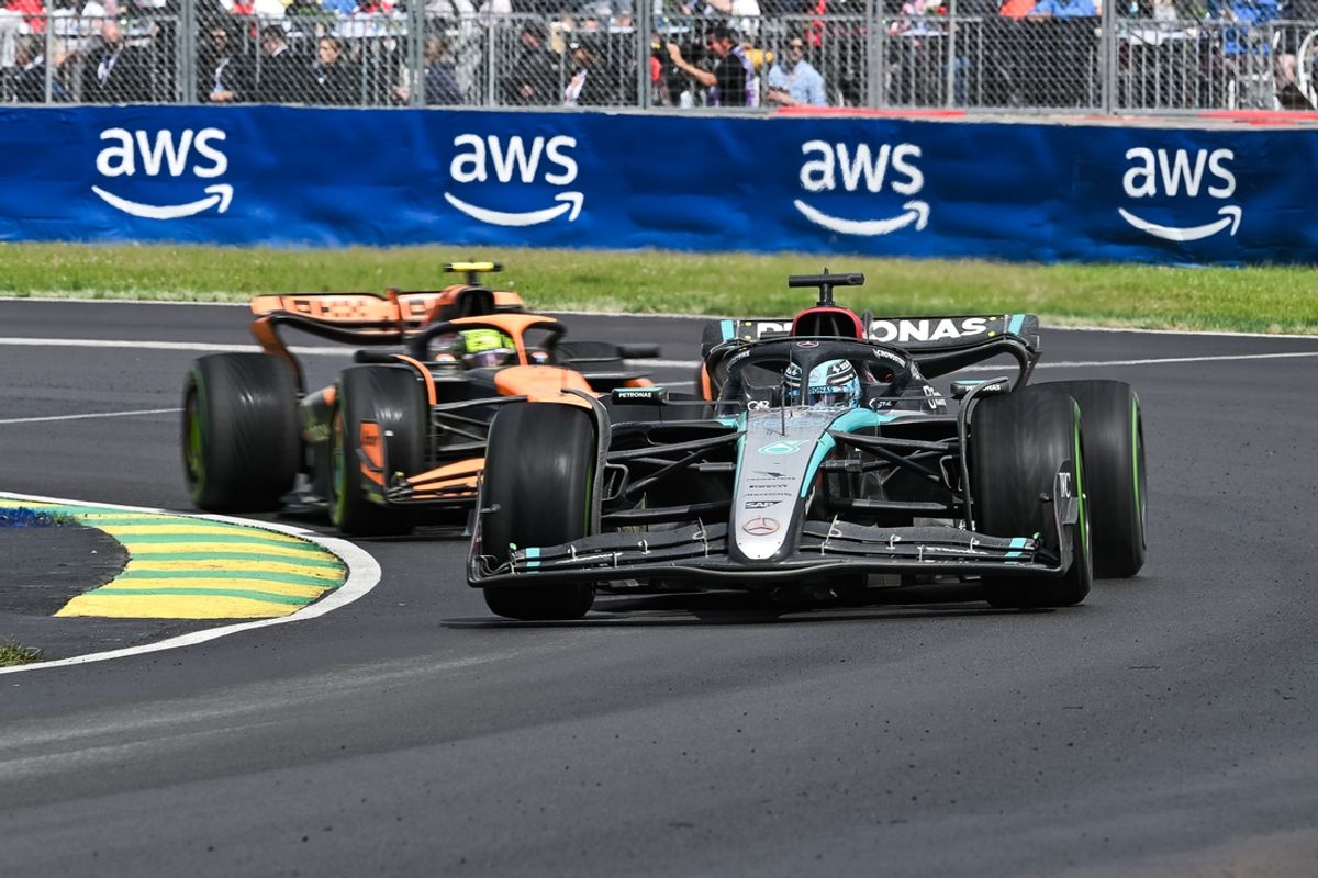 Jun 9, 2024; Montreal, Quebec, CAN; Mercedes driver George Russell (GBR) races ahead of McLaren driver Lando Norris (GBR) during the Canadian Grand Prix at Circuit Gilles Villeneuve. Mandatory Credit: David Kirouac-USA TODAY Sports