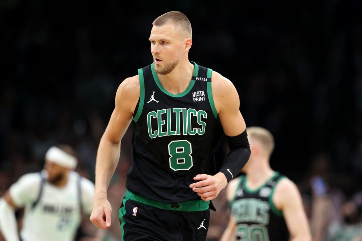 Jun 9, 2024; Boston, Massachusetts, USA; Boston Celtics center Kristaps Porzingis (8) reacts after a play against the Dallas Mavericks during the first quarter in game two of the 2024 NBA Finals at TD Garden. Mandatory Credit: Peter Casey-USA TODAY Sports