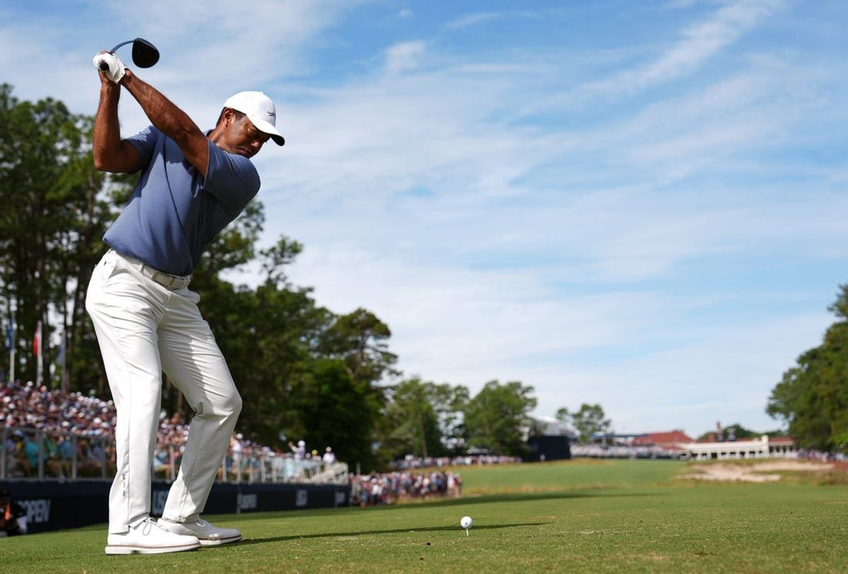 Jun 10, 2024; Pinehurst, North Carolina, USA; Tiger Woods tees off on the 18th hole during a practice round for the U.S. Open golf tournament at Pinehurst No. 2. Mandatory Credit: Katie Goodale-USA TODAY Sports