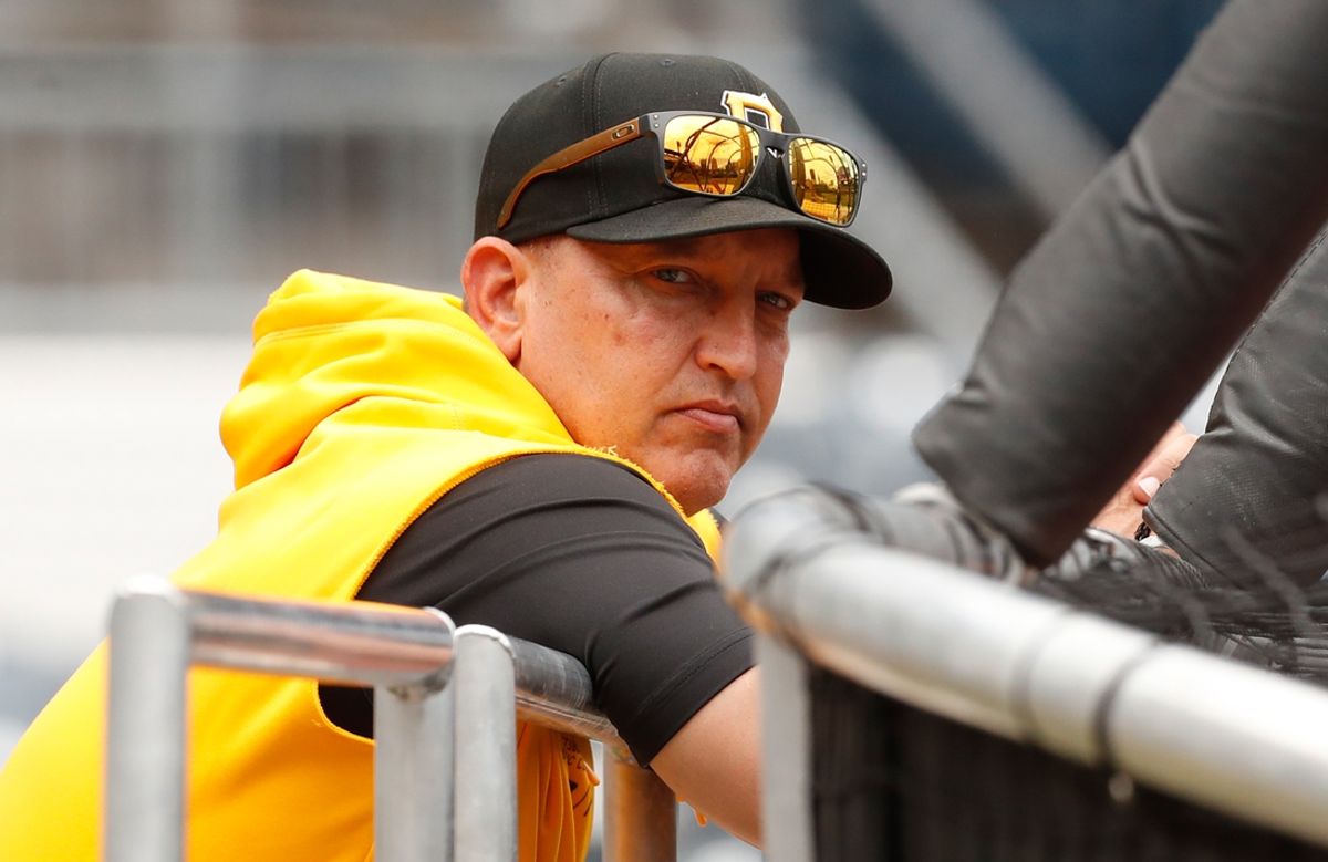Jun 7, 2024; Pittsburgh, Pennsylvania, USA;  Pittsburgh Pirates hitting coach Andy Haines (49) looks on at the batting cage before the game against he Minnesota Twins at PNC Park. Mandatory Credit: Charles LeClaire-Imagn Images