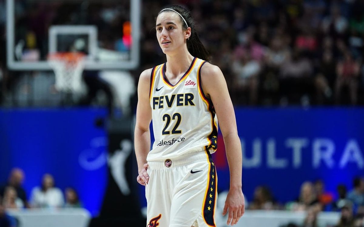 Jun 10, 2024; Uncasville, Connecticut, USA; Indiana Fever guard Caitlin Clark (22) reacts after her third foul against the Connecticut Sun in the second quarter at Mohegan Sun Arena. Mandatory Credit: David Butler II-USA TODAY Sports