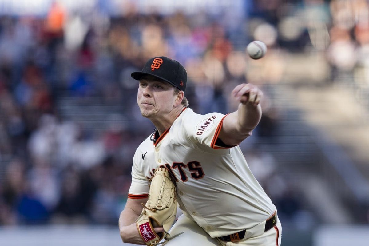 Jun 10, 2024; San Francisco, California, USA; San Francisco Giants starting pitcher Kyle Harrison (45) throws against the Houston Astros during the first inning at Oracle Park. Mandatory Credit: John Hefti-USA TODAY Sports