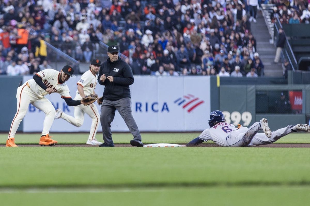 Jun 10, 2024; San Francisco, California, USA; Houston Astros center fielder Jake Meyers (6) steals second base in front of San Francisco Giants shortstop Brett Wisely (0) during the fifth inning at Oracle Park. Mandatory Credit: John Hefti-USA TODAY Sports