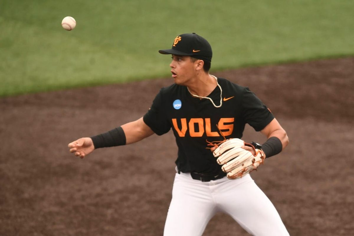 Tennessee's Dean Curley (23) loses the ball for the error during the Knoxville Super Regional of the NCAA baseball tournament on Sunday, June 9, 2024 in Knoxville, Tenn.