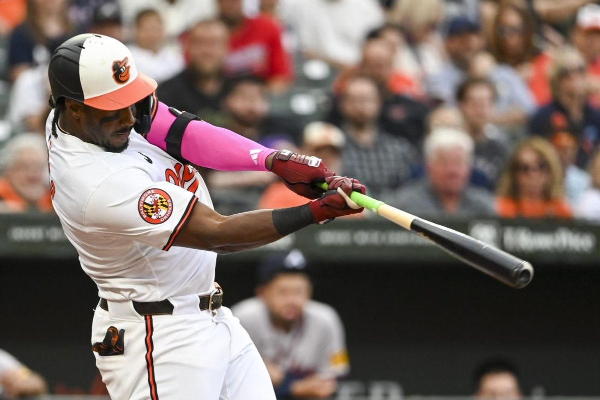 Jun 11, 2024; Baltimore, Maryland, USA; Baltimore Orioles shortstop Jorge Mateo (3) hits a   three run  home ruin in the second inning against the Atlanta Braves  at Oriole Park at Camden Yards. Mandatory Credit: Tommy Gilligan-USA TODAY Sports
