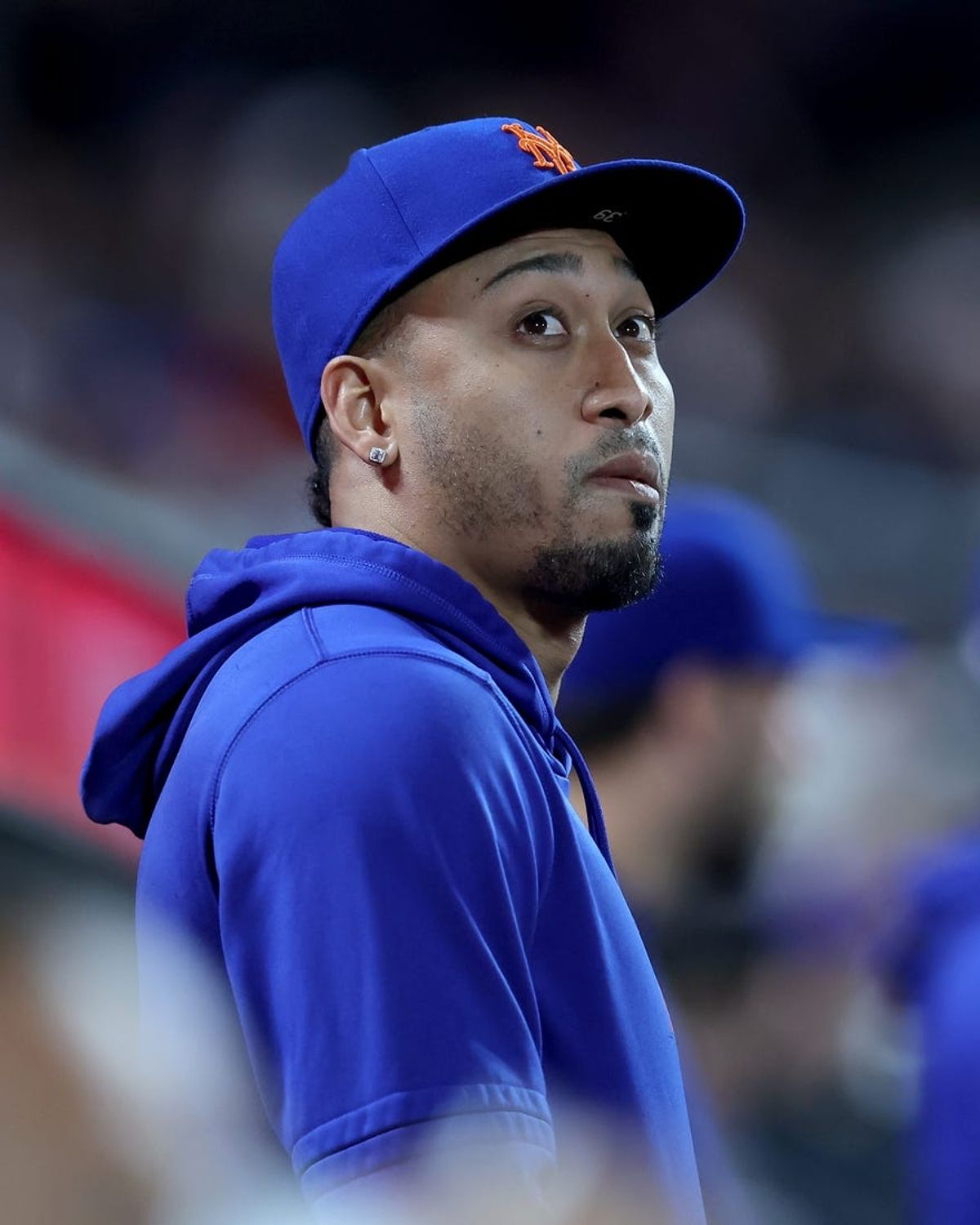 Jun 11, 2024; New York City, New York, USA; New York Mets relief pitcher Edwin Diaz watches from the dugout during the seventh inning against the Miami Marlins at Citi Field. Mandatory Credit: Brad Penner-USA TODAY Sports