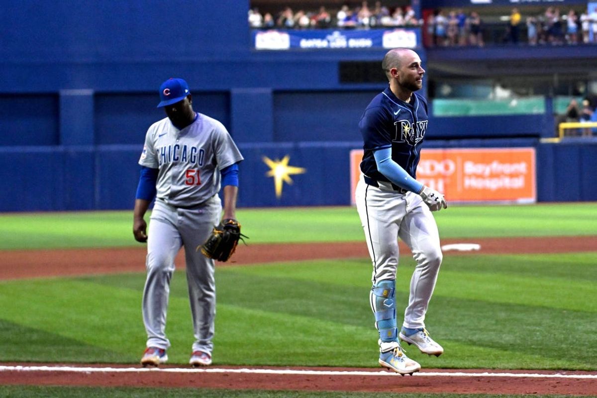 Jun 11, 2024; St. Petersburg, Florida, USA; Tampa Bay Rays designated hitter Brandon Lowe (8) celebrates after hitting a three run home run in the ninth inning for the walk off win against the Chicago Cubs at Tropicana Field. Mandatory Credit: Jonathan Dyer-USA TODAY Sports