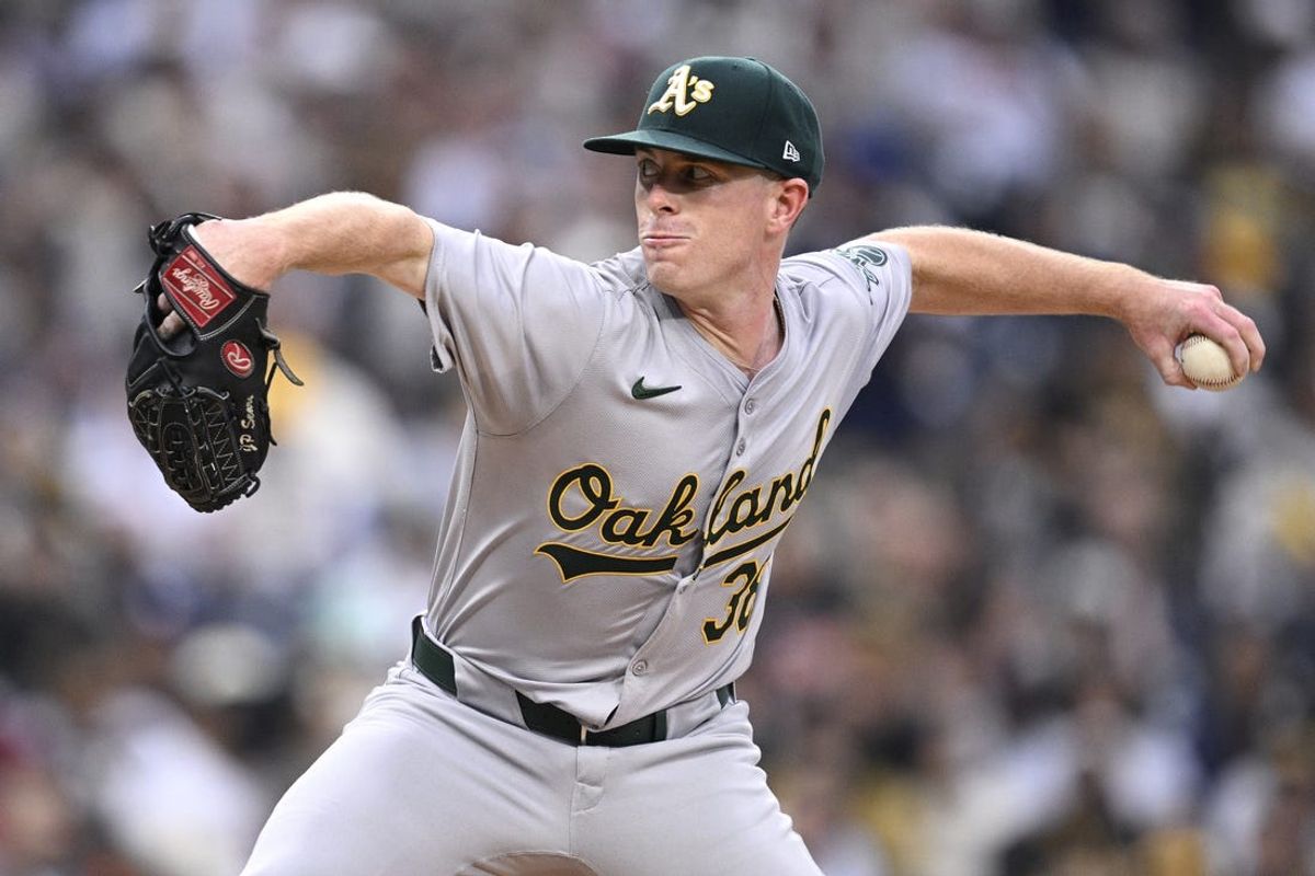 Jun 11, 2024; San Diego, California, USA; Oakland Athletics starting pitcher JP Sears (38) pitches against the San Diego Padres during the first inning at Petco Park. Mandatory Credit: Orlando Ramirez-USA TODAY Sports